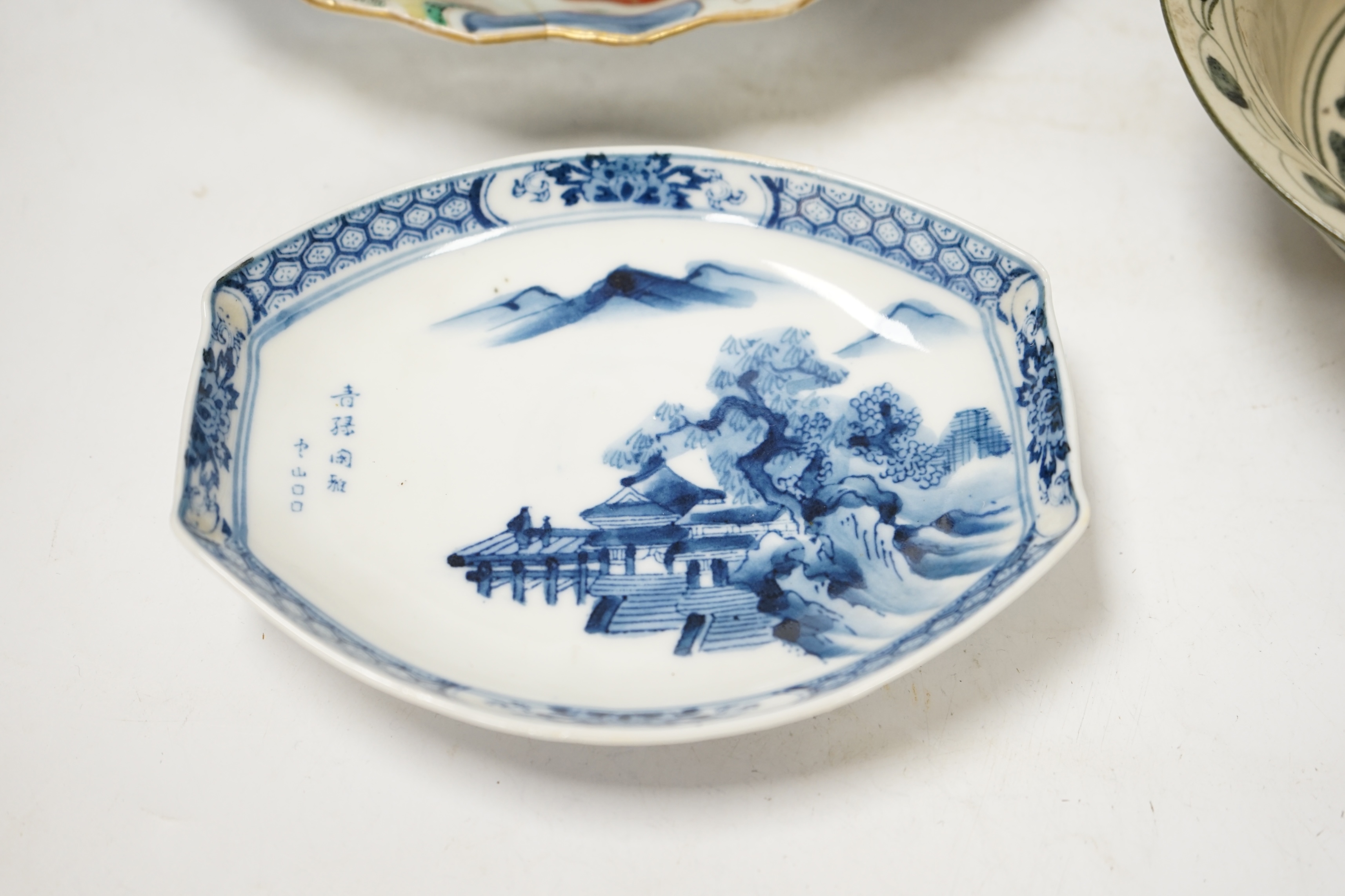 Japanese ceramics to include an Imari vase and bowl and a blue and white dish, 22cm diameter. Condition - two bowls and dish good, others poor